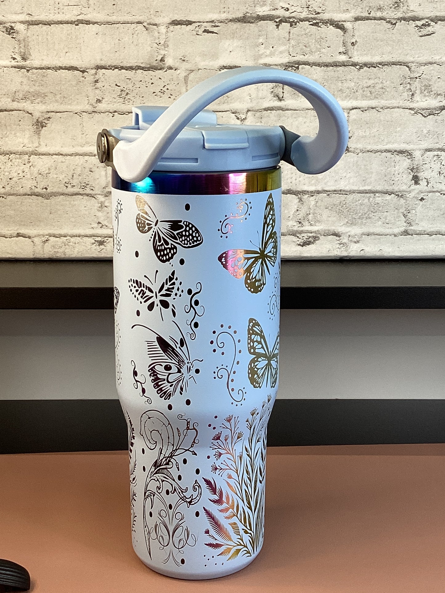 This 30 oz stainless steel tumbler features Sleek, Durable