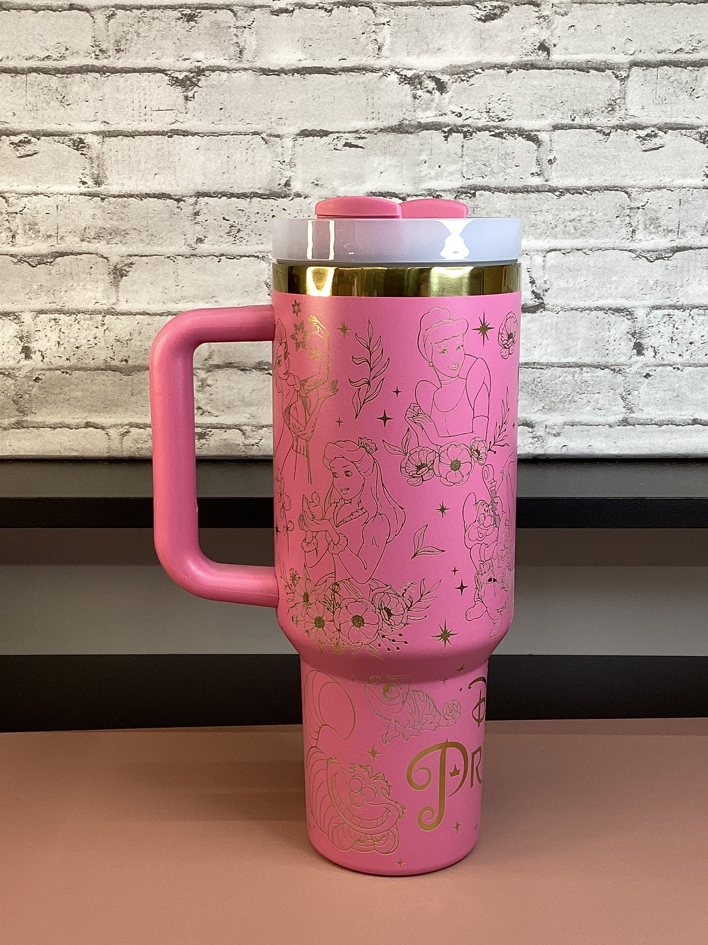 This 40 oz stainless steel pink tumbler, laser-engraved  design