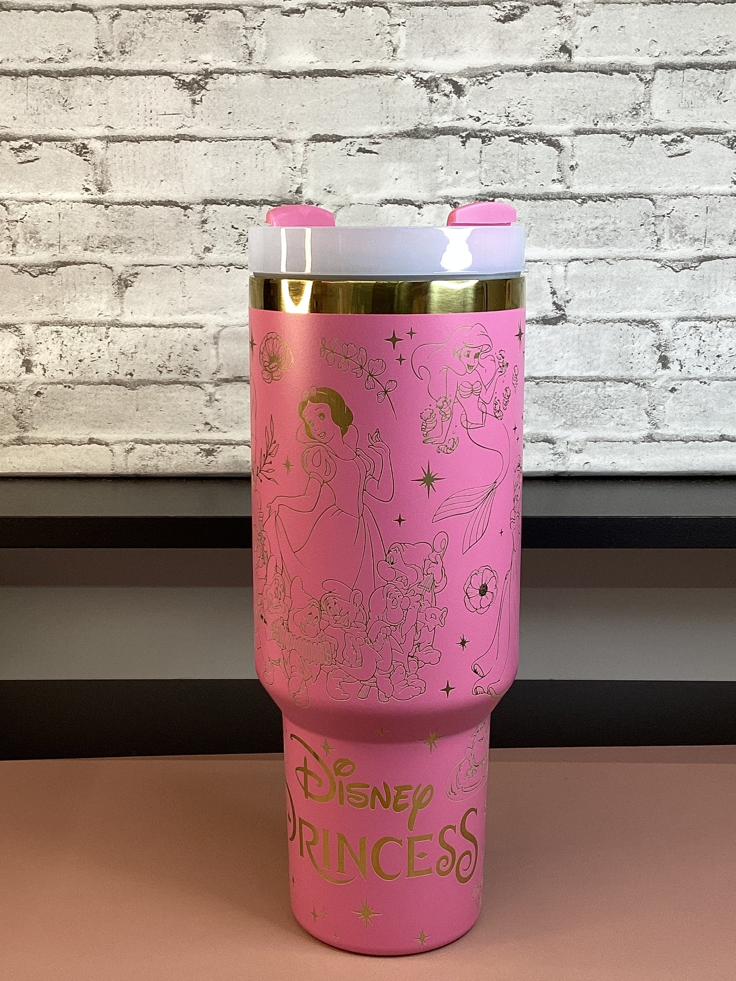 This 40 oz stainless steel pink tumbler, laser-engraved  design