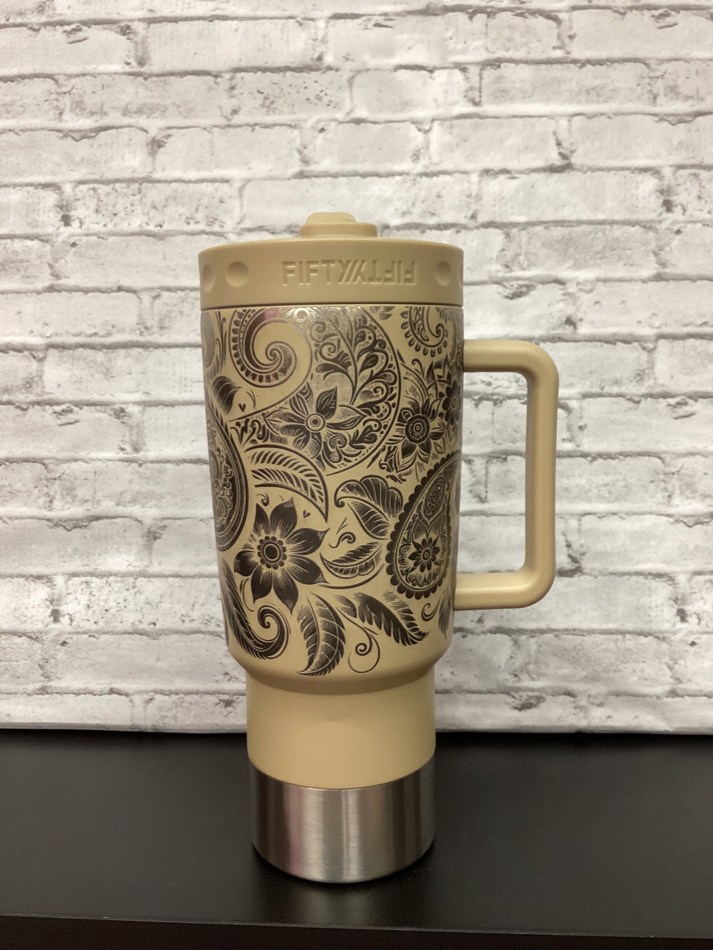 The Fifty Fifty 30 oz tumbler Tan color w/ laser.