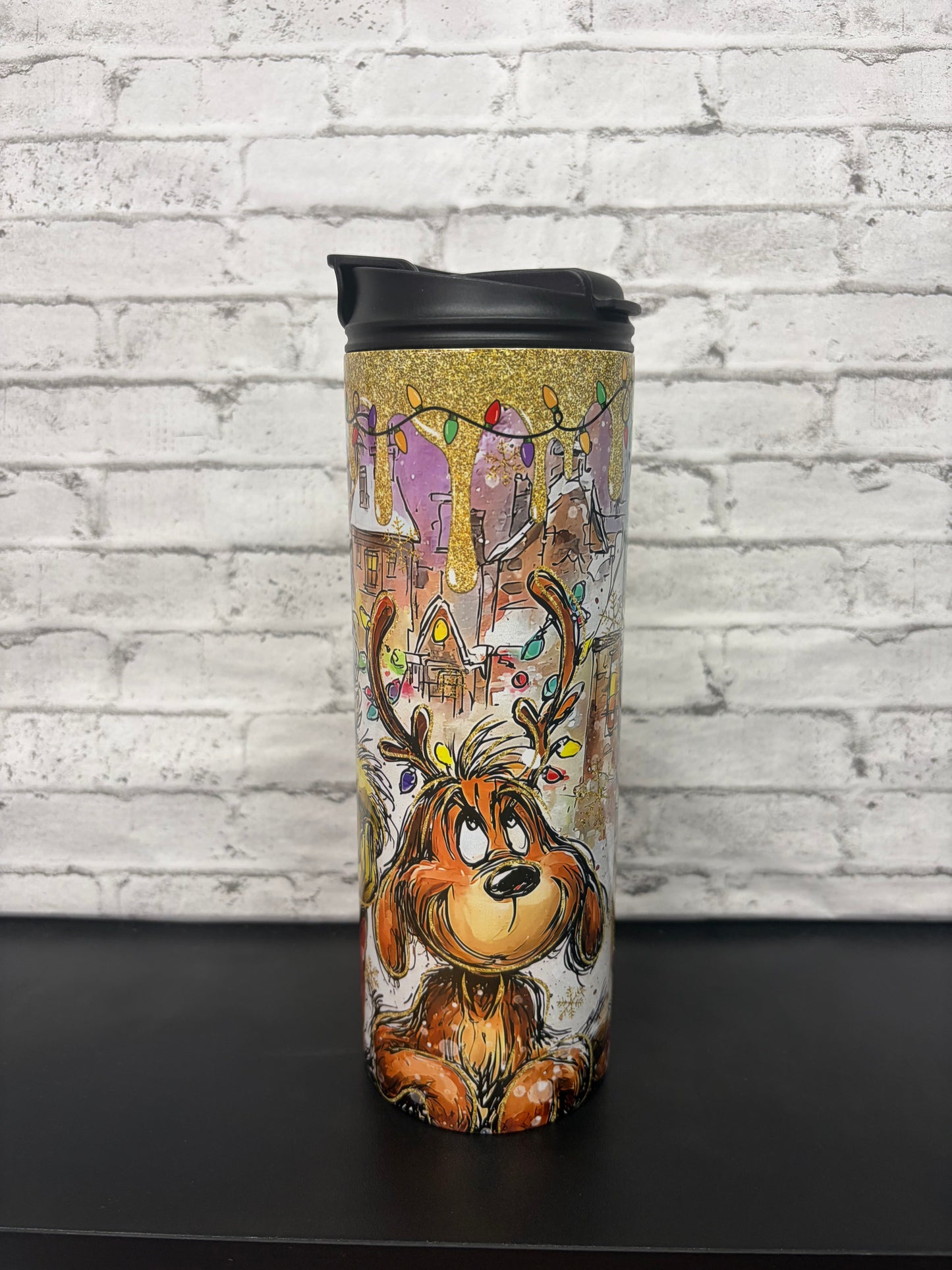 20 oz stainless steel tumbler, engineered for durability and portability Featuring vibrant Grinch-inspired artwork