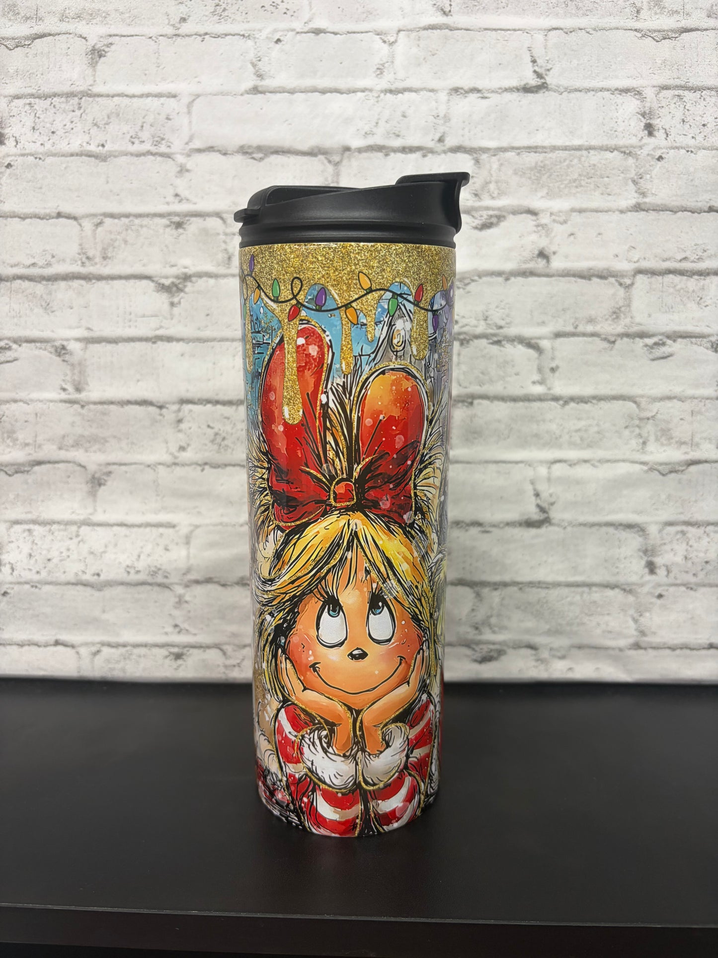 20 oz stainless steel tumbler, engineered for durability and portability Featuring vibrant Grinch-inspired artwork