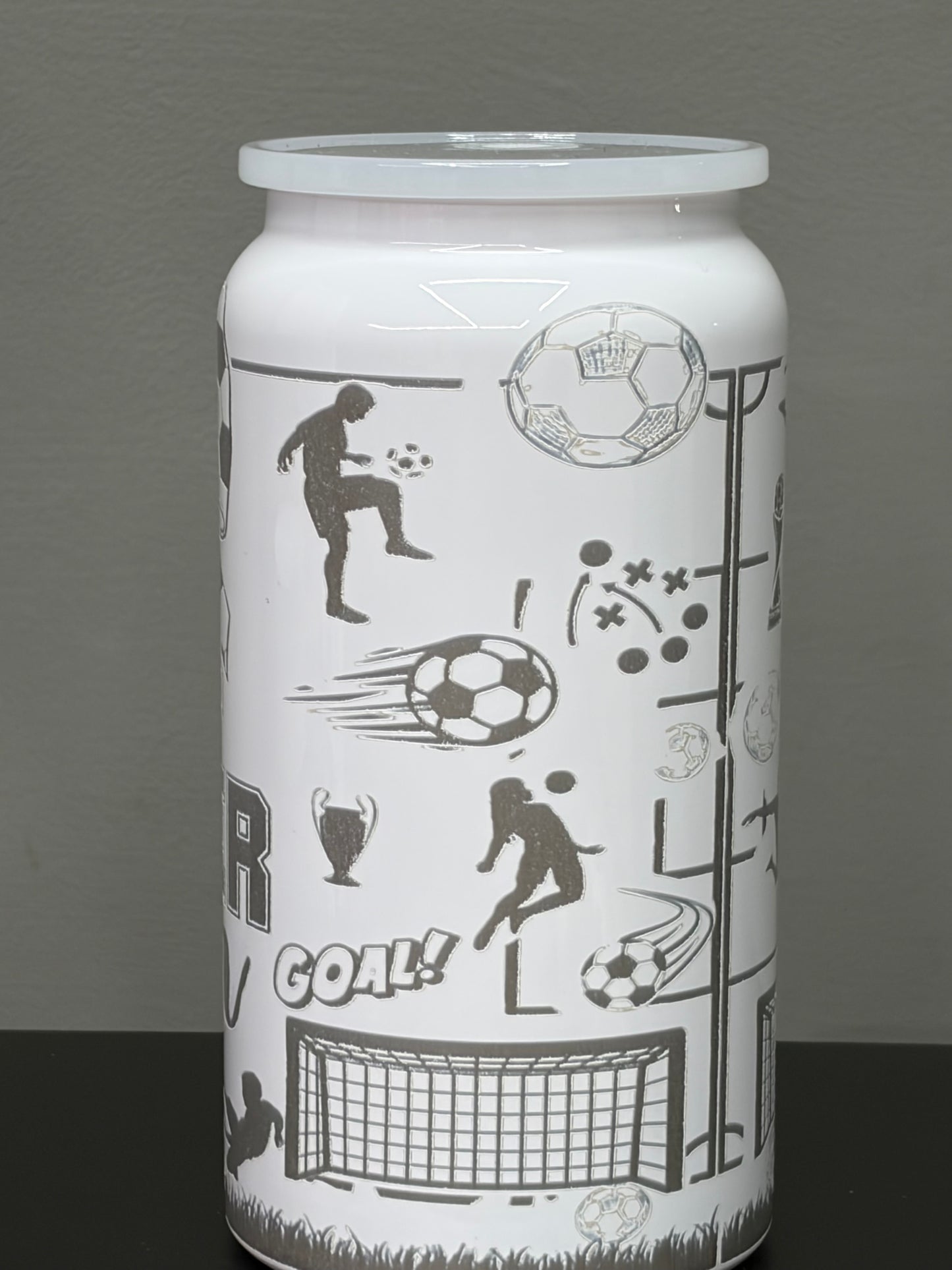16oz stainless steel tumbler laser-engraved with a distinctive mom soccer design