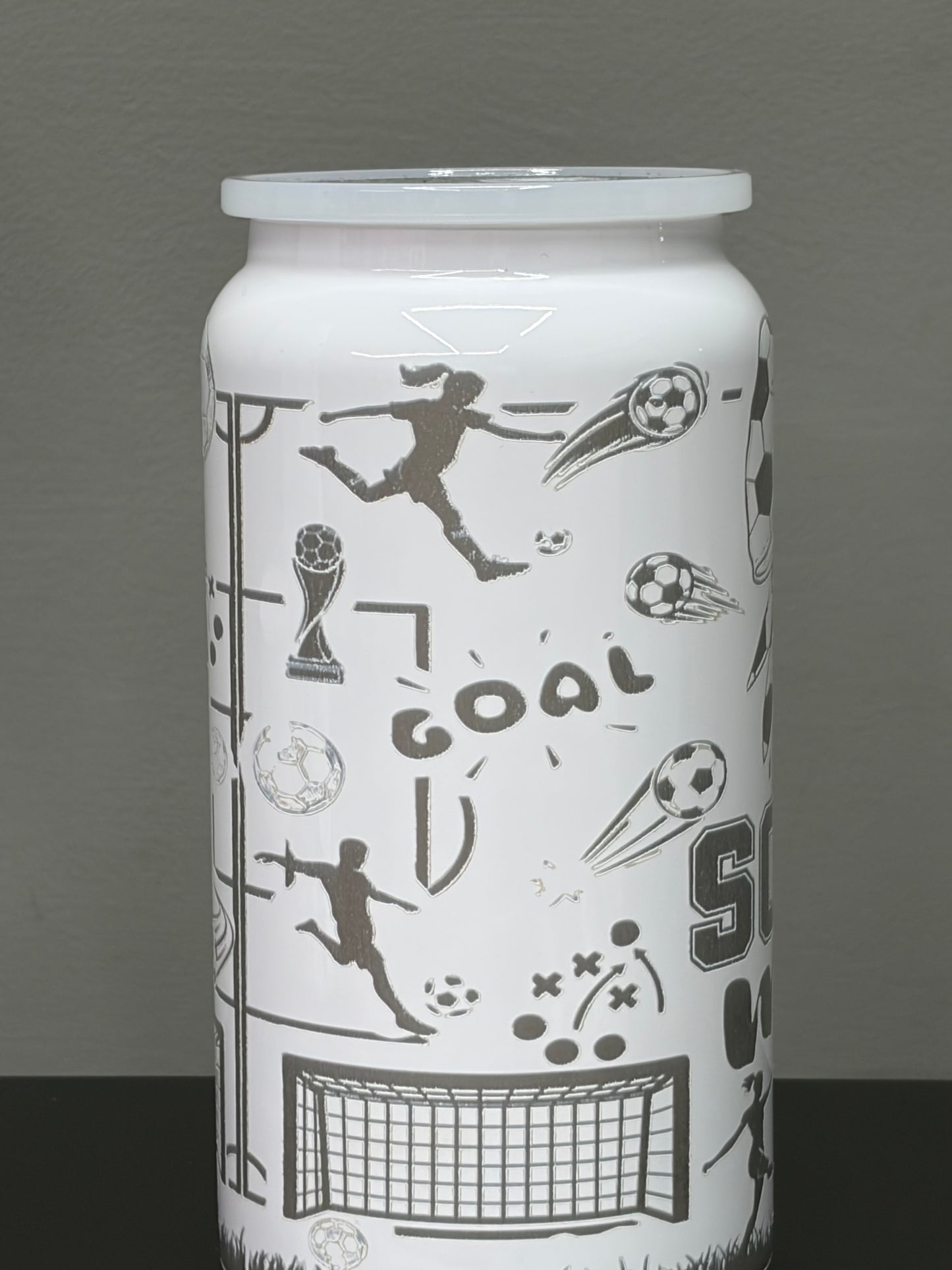 16oz stainless steel tumbler laser-engraved with a distinctive mom soccer design