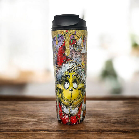 20 oz stainless steel tumbler, engineered for durability and portability Featuring vibrant Grinch-inspired artwork
