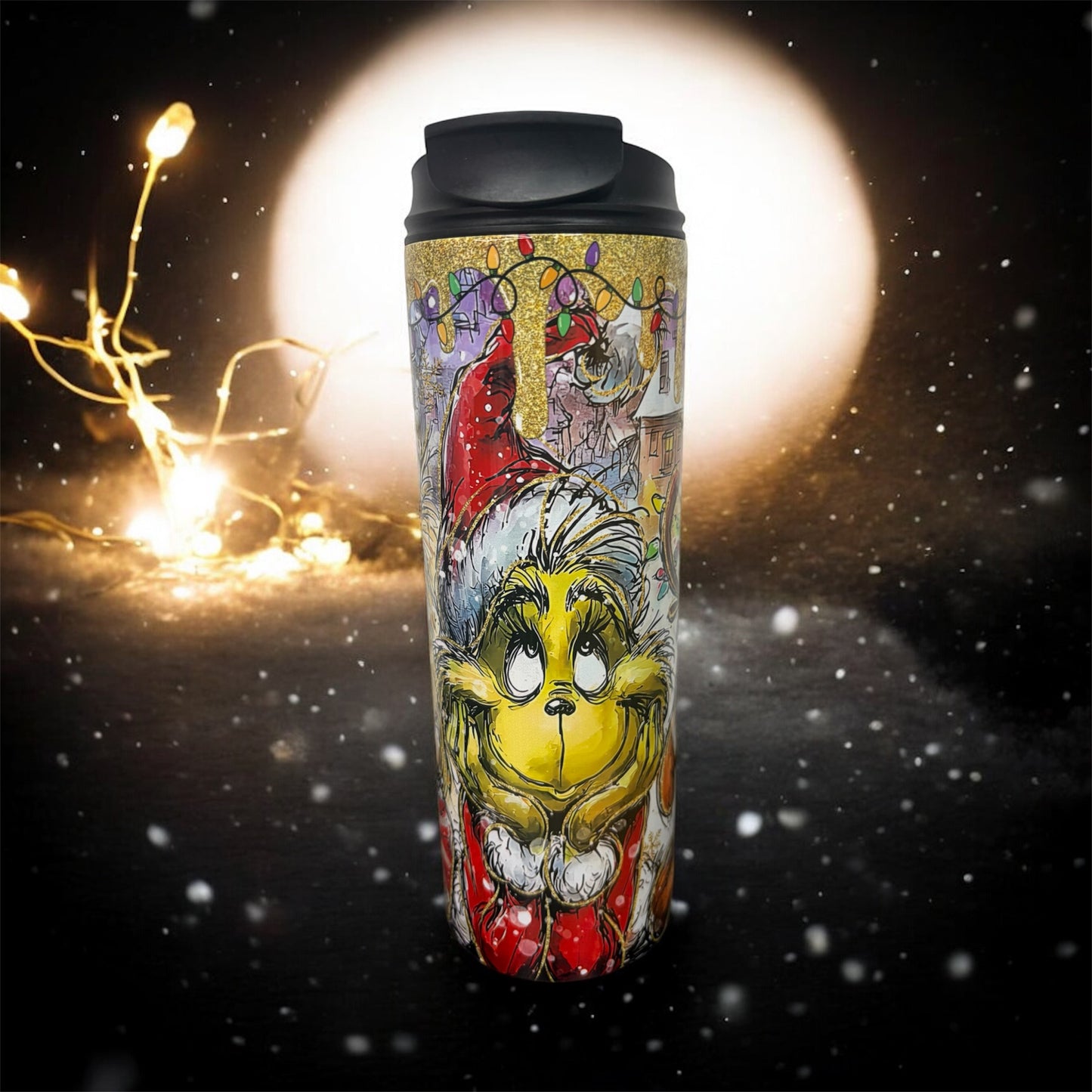 20 oz stainless steel tumbler, engineered for durability and portability Featuring vibrant Grinch-inspired artwork