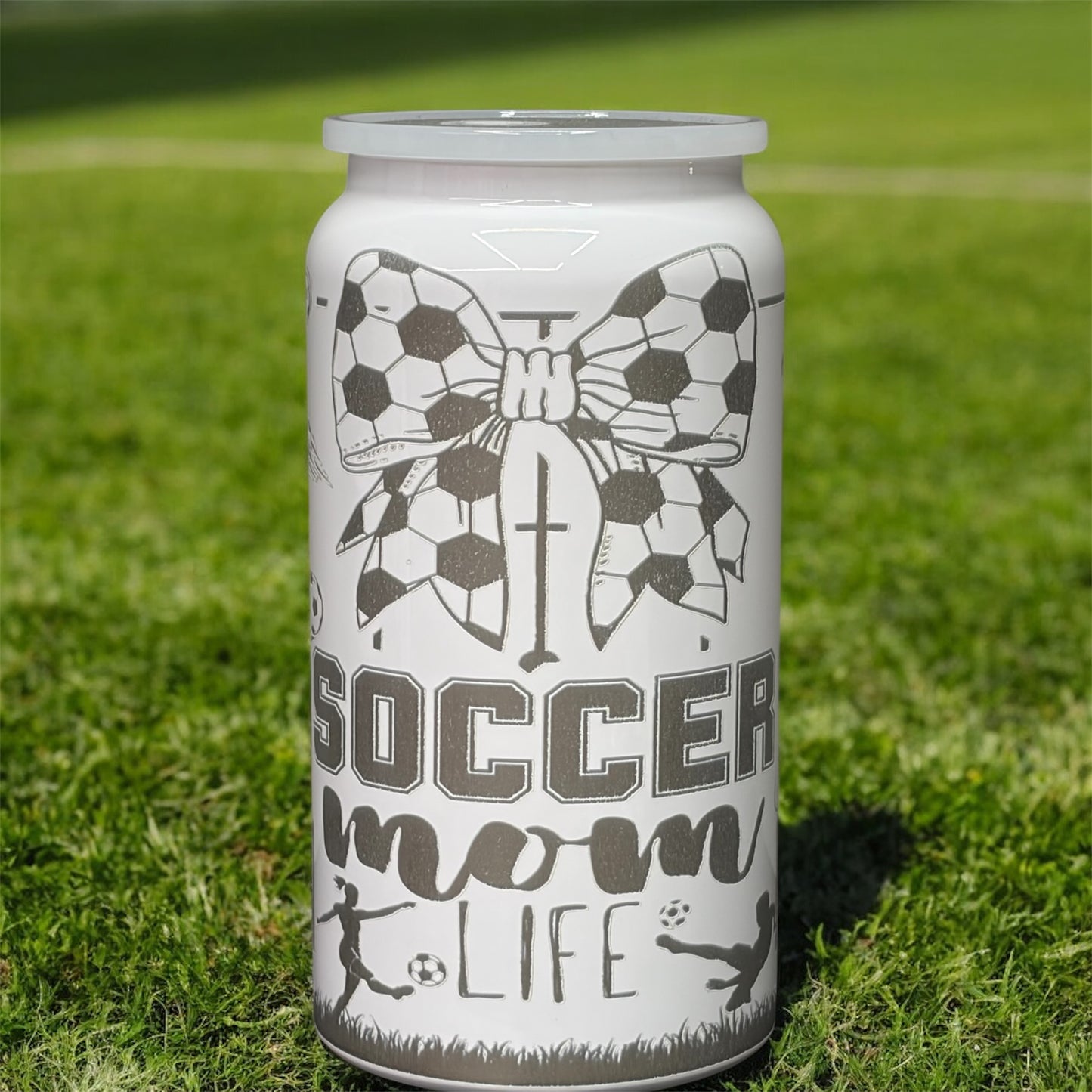 16oz stainless steel tumbler laser-engraved with a distinctive mom soccer design
