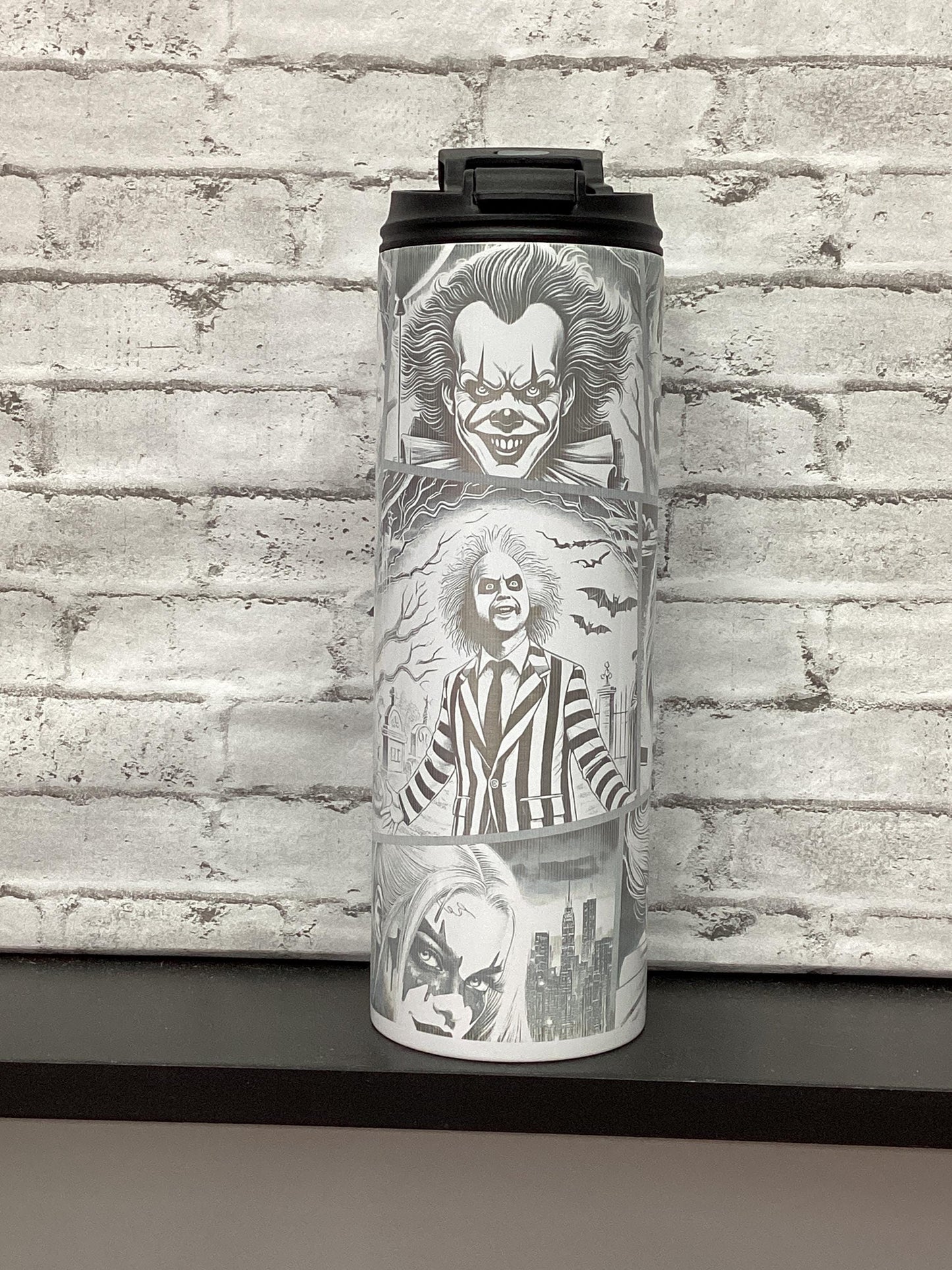 Halloween 20oz tumbler laser engraved with different characters