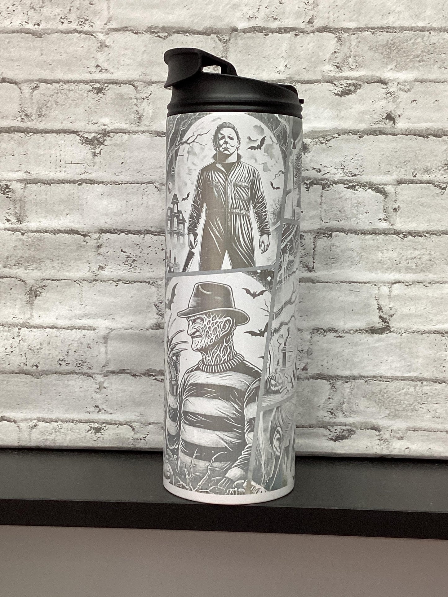 Halloween 20oz tumbler laser engraved with different characters