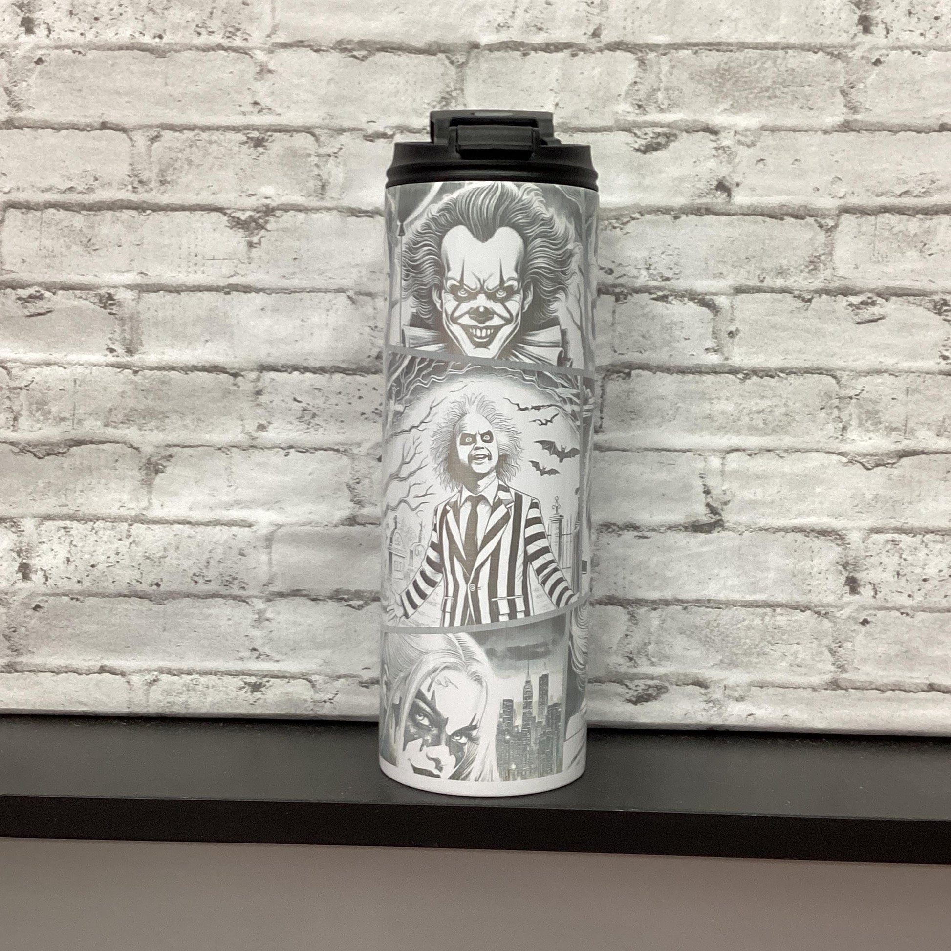 Halloween 20oz tumbler laser engraved with different characters