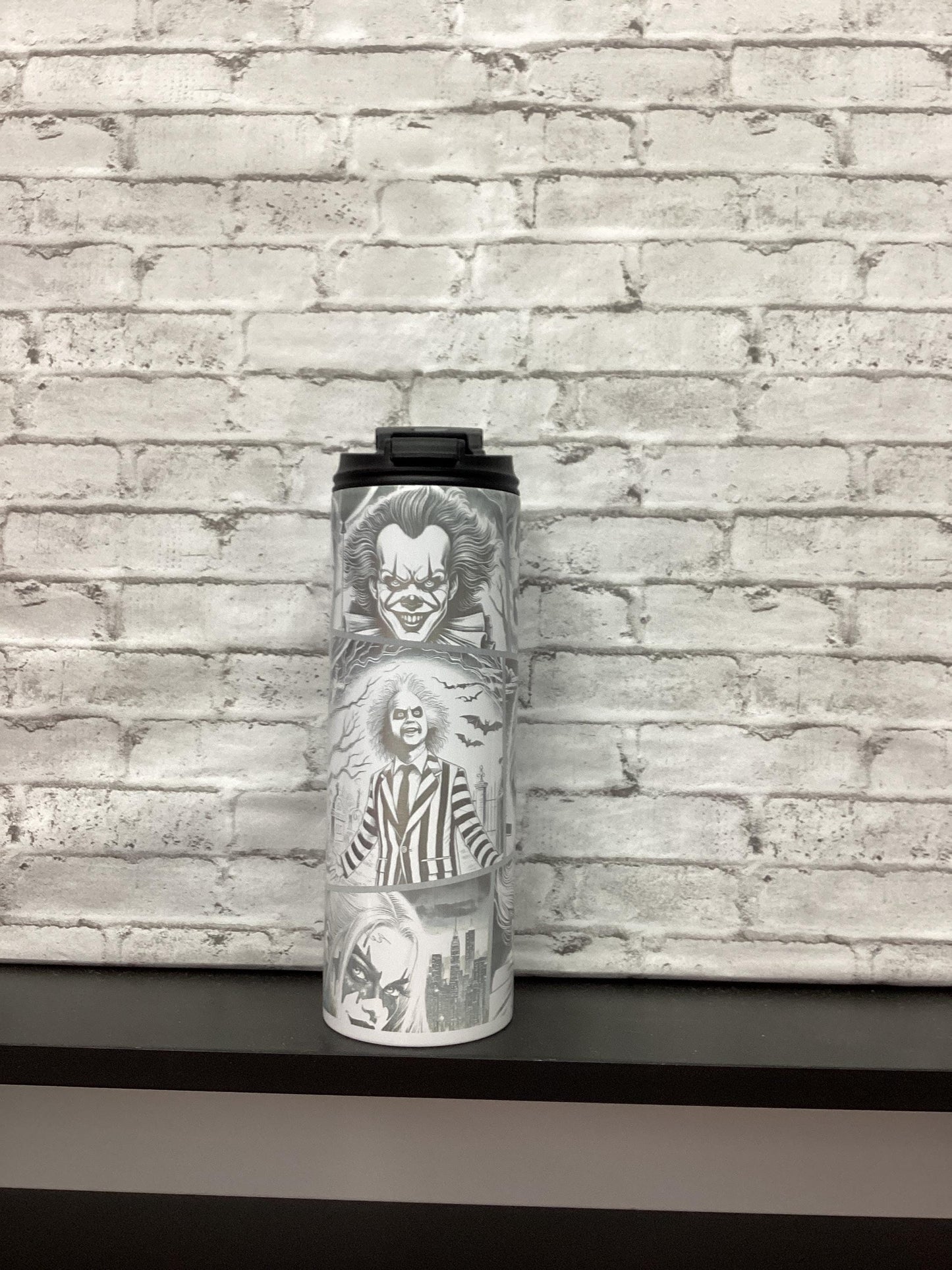 Halloween 20oz tumbler laser engraved with different characters