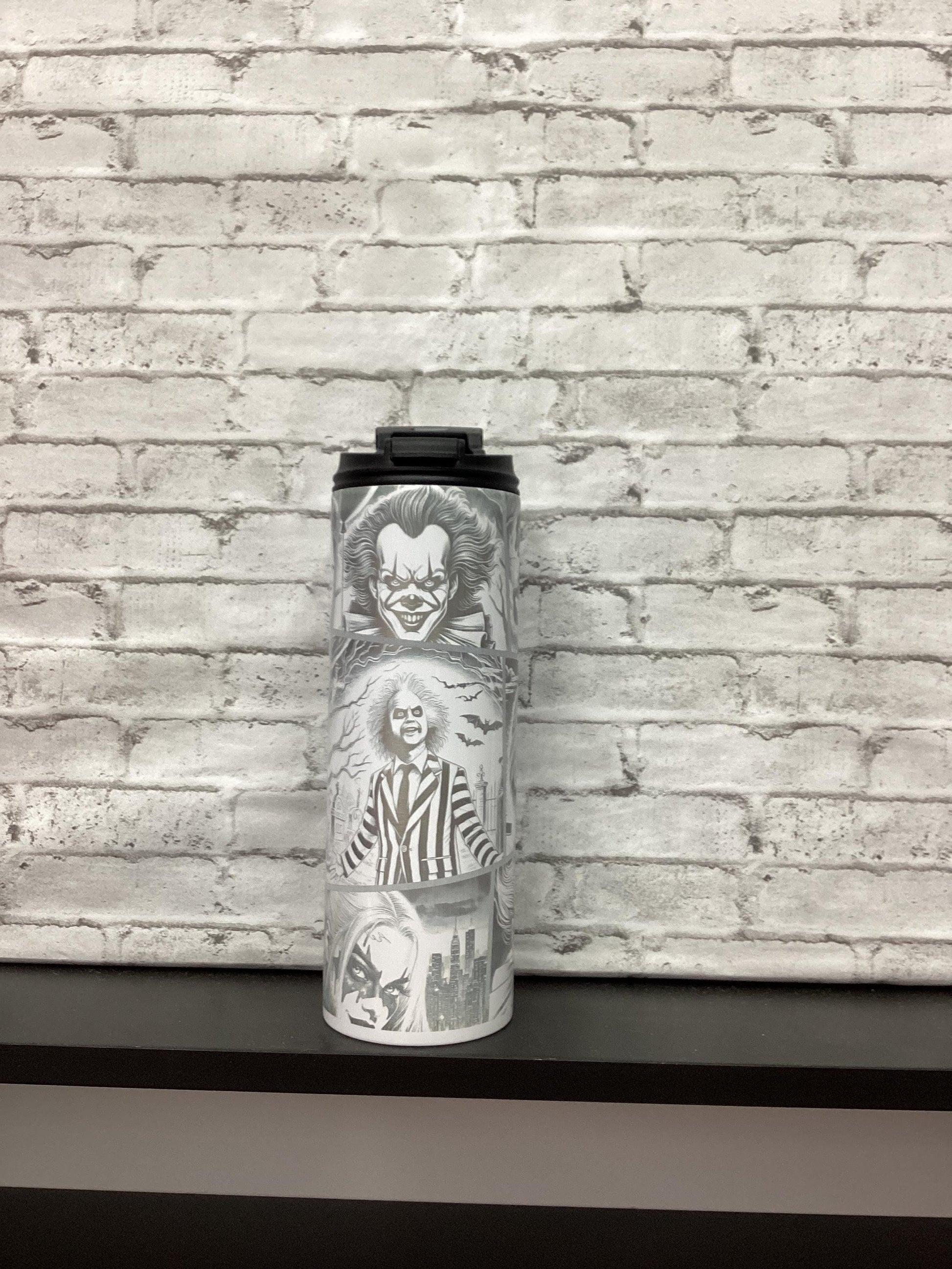 Halloween 20oz tumbler laser engraved with different characters