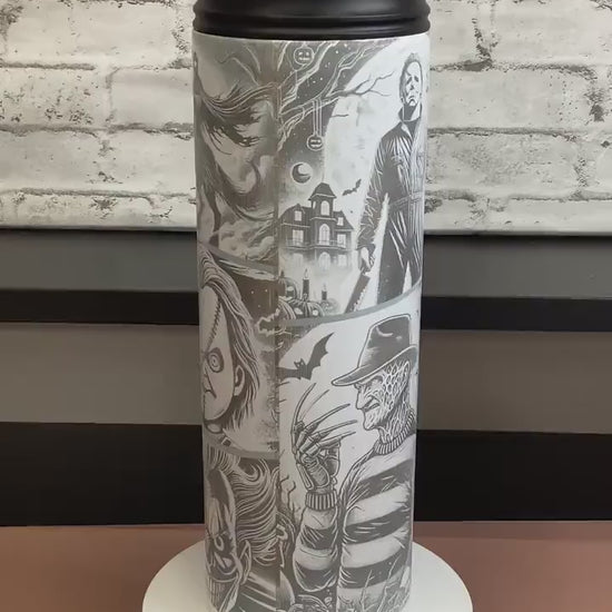 Halloween 20oz tumbler laser engraved with different characters